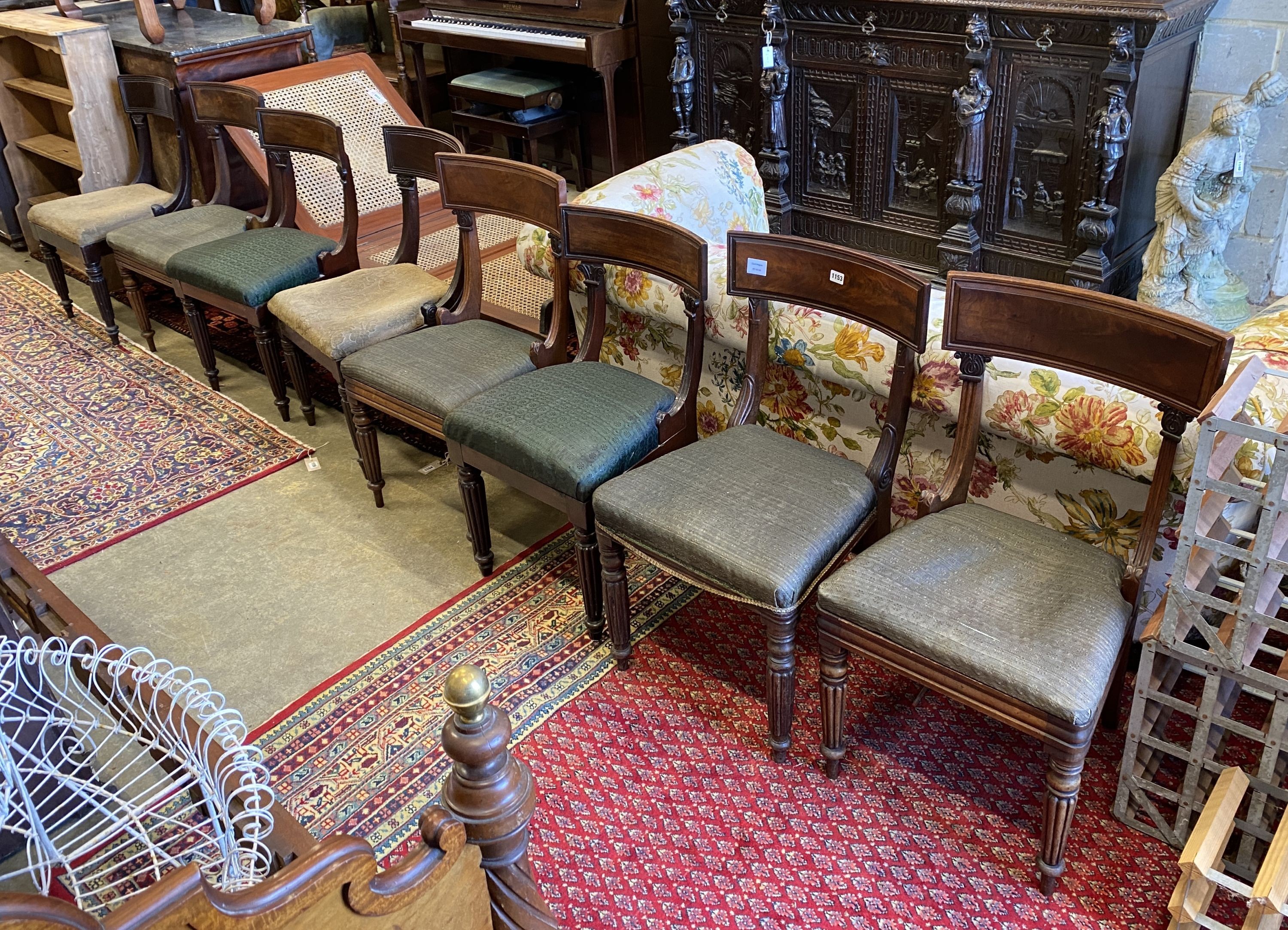 A harlequin set of eight early Victorian mahogany dining chairs